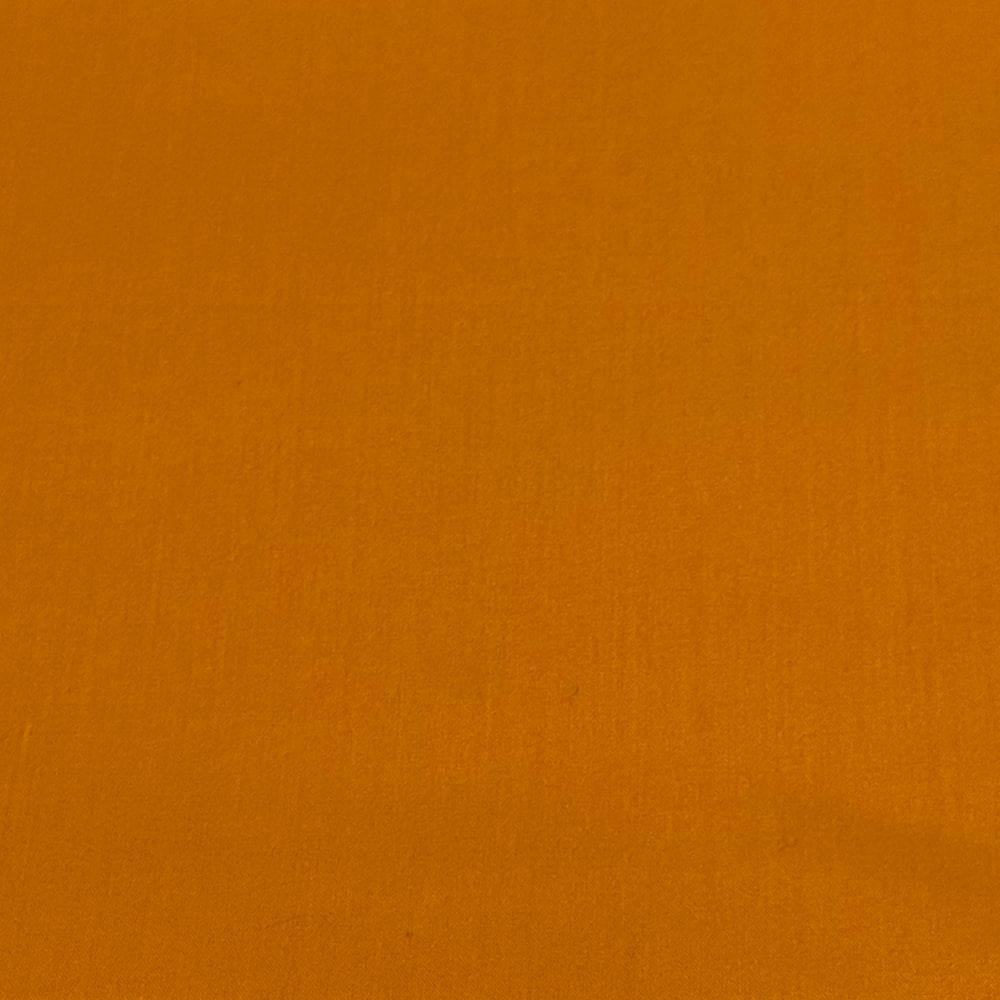 Feldman Solid Light Orange Quilting Broadcloth Fabric